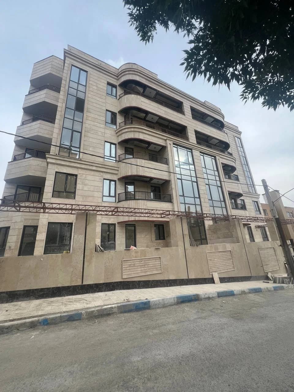 Completed stone facade of the Lotus residential building